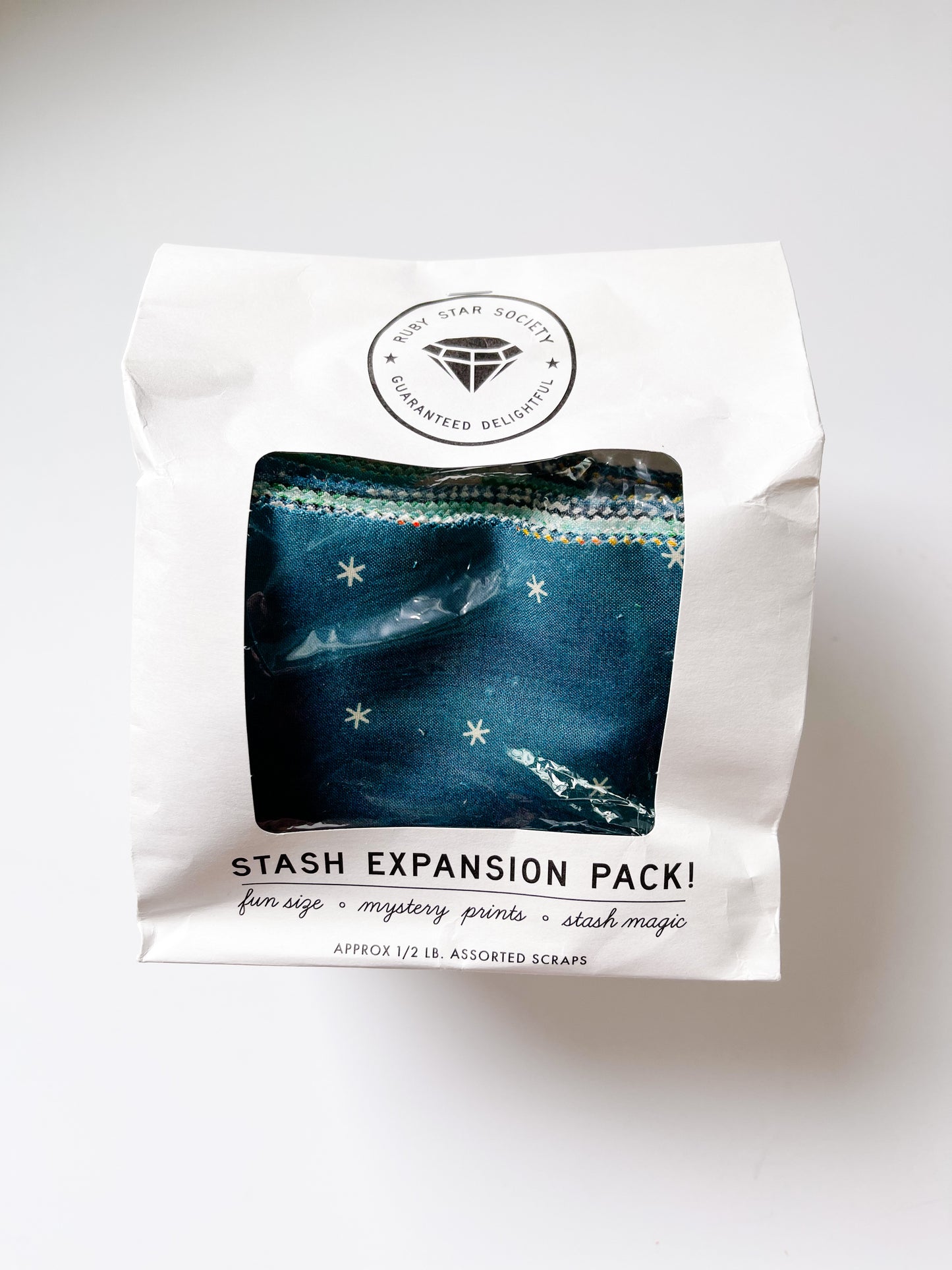Ruby Star Society Scrap Expansion Pack with teal spark fabric showing