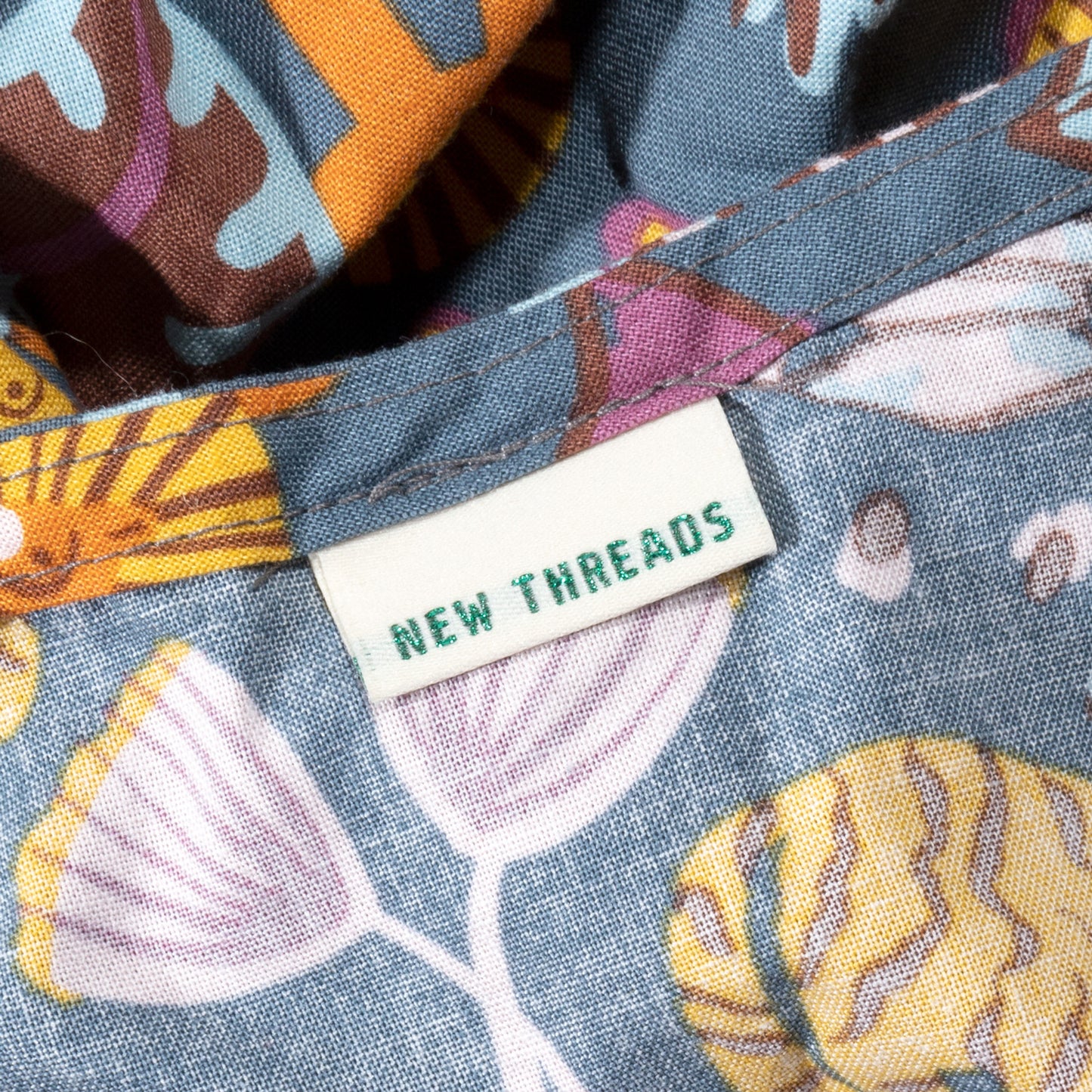 KATM Metallic Woven Sewing Label sewn into a garment