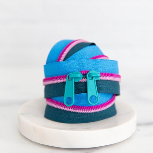 30" Zipper Mermaid, a bright blue and navy zipper with purple teeth and turquoise pulls