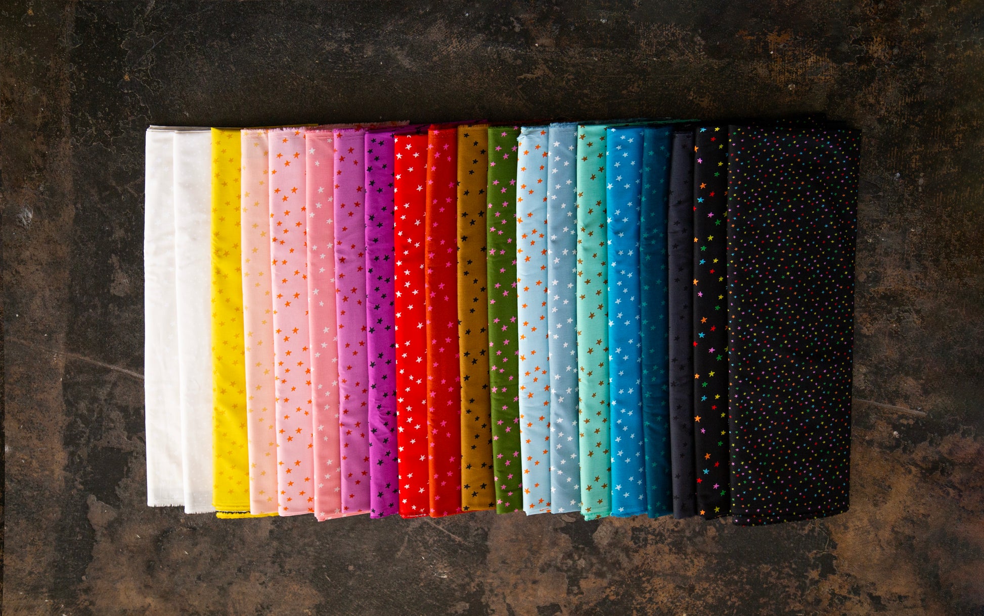 new colors of starry fabric on dark background