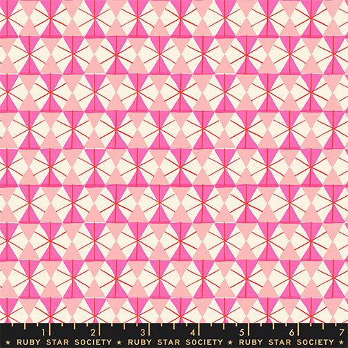 Geometric pattern fabric from merry happy collection with pink and cream triangles and 'Ruby Star Society' label at the bottom.