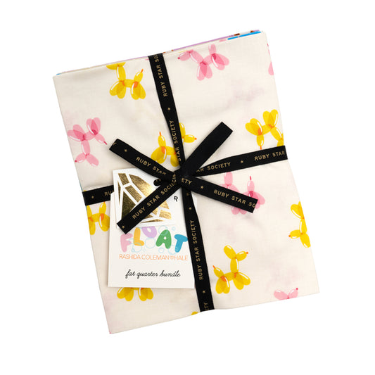 Fabric bundle with balloon dog pattern and Ruby Star Society label on a white background