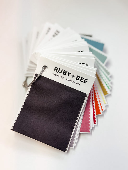 Color swatch book with 'Ruby + Bee' branding on a white background