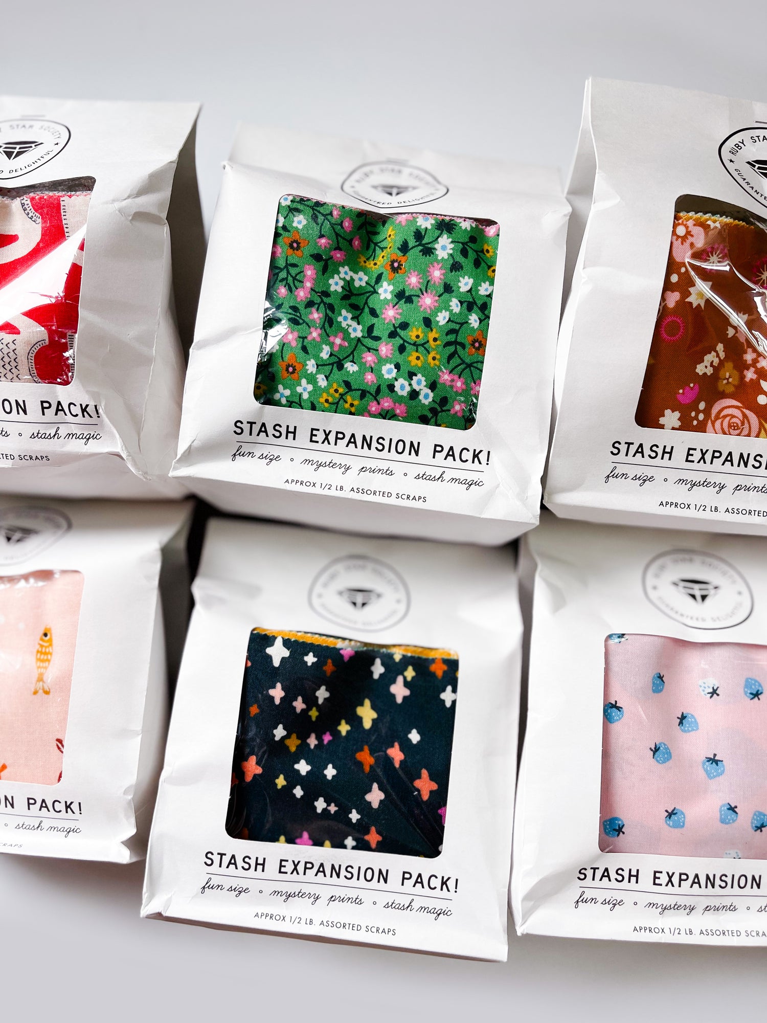Ruby Star Society Stash Expansion Pack. Each mystery bag contains half a pound of Ruby Star Society Scraps. A collection of RSS Stash Expansion Scrap Packs