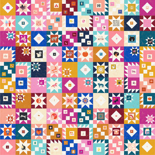 ten years of magic quilt kit by ruby star society. Colorful pink, blue and gold quilt with lots of stars and fussy cut motifs